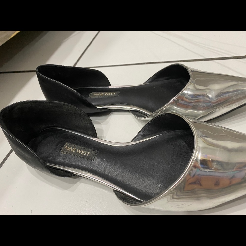 point black and silver flats